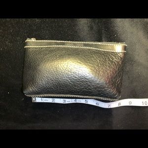 Dooney wristlet. Still has some use in it!